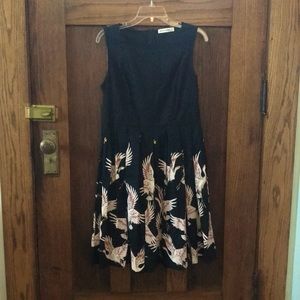 Black dress with pleated crane skirt
